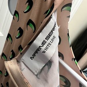 Beige  high fashion romper. Stretchy size small